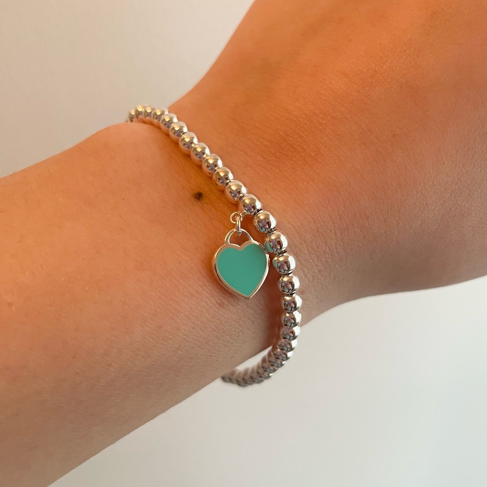 Tiffany and co mini heart tag bead bracelet
in silver